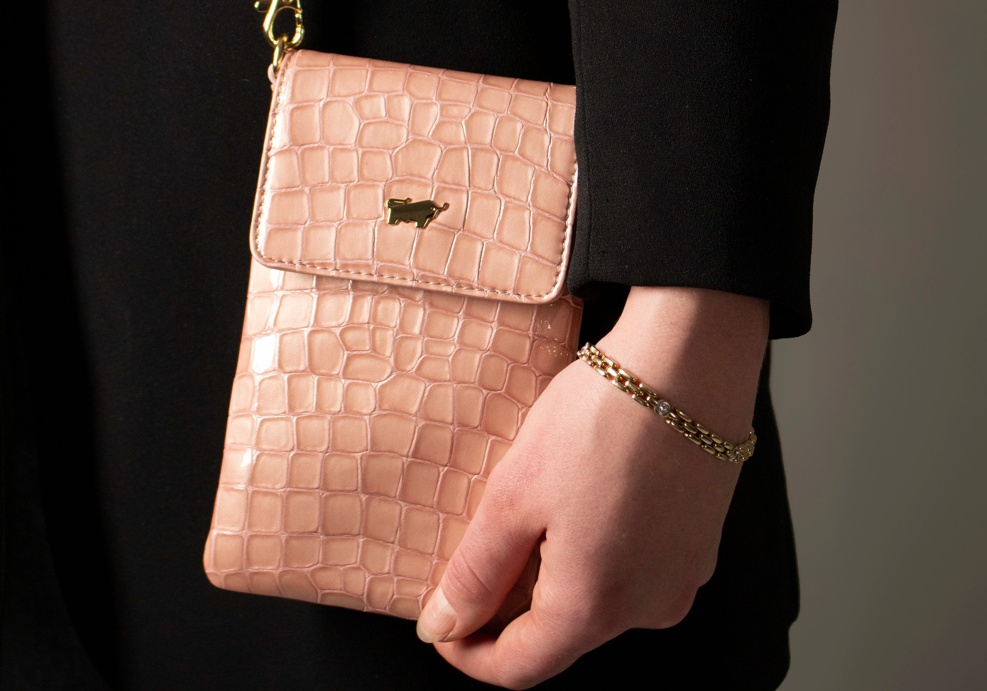 rosa Ledertasche in kroko Optik